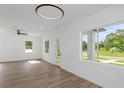 The living room is bright and spacious with hardwood floors and natural light at 711 42Nd S Ave, St Petersburg, FL 33705