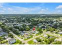 Areal view of the neighborhood with lush trees and blue skies at 774 40Th Ne Ave, St Petersburg, FL 33703