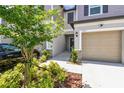 Charming townhome with attached garage, nicely landscaped yards, and neutral exteriors at 2513 Sunray Venus Way, Ruskin, FL 33570
