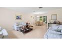 Comfortable living room featuring tile flooring at 2875 Lomond Dr, Palm Harbor, FL 34684