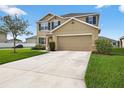 Charming two-story home showcasing a well-maintained lawn and a spacious driveway at 3125 S Northview Rd, Plant City, FL 33566