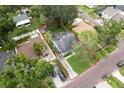 Aerial view of property showing the house, surrounding neighborhood, and boundaries outlined in red at 3503 W Palmira Ave, Tampa, FL 33629