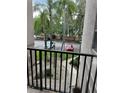 Outside view showing parking, landscaping and exterior of building at 4207 Winding Moss Trl # 201, Tampa, FL 33613