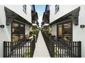 Charming townhouse patios feature stylish decor, providing a serene outdoor living space at 3005 1St N Ave, St Petersburg, FL 33713