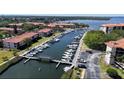 Aerial view of the community marina with boat slips and waterfront condos at 244 & 243 Mariner Dr # 243-244, Tarpon Springs, FL 34689