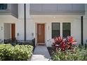 Well-maintained townhouse with modern design and inviting landscaping at 2511 N Grady Ave # 43, Tampa, FL 33607