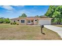 Charming single story home with a manicured front yard at 2627 Hancock St, Plant City, FL 33563