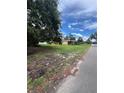 Vacant grassy lot next to the street, offering potential for development or landscaping at 5631 23Rd S Ave, Gulfport, FL 33707