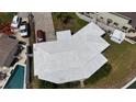 Home with multiple parking spaces and pool access, located in a waterfront community at 649 Normandy Rd, Madeira Beach, FL 33708