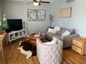 Comfortable living room with hardwood floors and modern furnishings at 1301 S Howard Ave # C4, Tampa, FL 33606