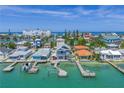Coastal home boasts waterfront views and docks, perfect for boating enthusiasts at 340 Bay Plaza, Treasure Island, FL 33706