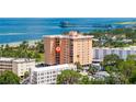 Aerial view of condo complex with water views and mature landscaping at 1120 N Shore Ne Dr # 503, St Petersburg, FL 33701