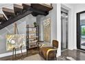 Unique staircase showcasing a modern chair, art easel, and elevator for added convenience at 131 Forest Hills Dr, Redington Shores, FL 33708