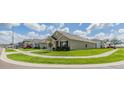 This home is nestled in a community and features an eye-catching lawn and a comfortable single-story design at 13304 Mylion Way, Spring Hill, FL 34610