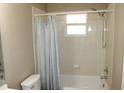 Clean bathroom with a shower-tub combination and standard fixtures at 208 Wilson Ave, Brooksville, FL 34601