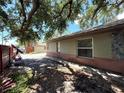 Side exterior view showcasing brick and stone accents and a large window at 2800 13Th N Ave, St Petersburg, FL 33713