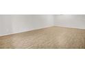 Spacious room with hardwood flooring great for a home office or den at 2222 Norwegian Dr # 16, Clearwater, FL 33763