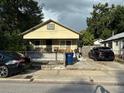 Charming single-story home with covered front porch and driveway parking at 2909 N 11Th St, Tampa, FL 33605