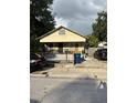 Charming single-story home with covered front porch and driveway parking at 2909 N 11Th St, Tampa, FL 33605