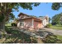 This charming home features a spacious two-car garage and well-manicured landscaping at 4355 Odin St, Spring Hill, FL 34608
