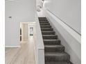 Bright interior with a carpeted staircase leading to the upper level at 5203 Oak Charter Ct # 5203, Temple Terrace, FL 33617
