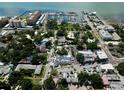 Aerial view showcasing the coastal condo's proximity to the marina and surrounding community at 702 Lyndhurst St # 822, Dunedin, FL 34698