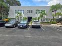 Condo complex with reserved parking and well maintained landscaping at 702 Lyndhurst St # 822, Dunedin, FL 34698