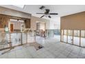 Spacious kitchen area with tile flooring awaiting renovation at 7400 Locust Ne St, St Petersburg, FL 33702