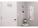 Bright hallway with coastal-themed decor and modern accents at 1004 Osage St, Clearwater, FL 33755