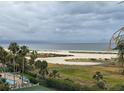 Aerial view of beach access by boardwalk to enjoy the ocean and coastline at 1230 Gulf Blvd # 601, Clearwater Beach, FL 33767