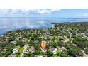 Panoramic aerial view of a waterfront community with expansive water views and lush greenery at 211 60Th S Ave, St Petersburg, FL 33705