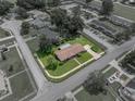Aerial view with highlighted property lines, showcasing the home's position in the neighborhood at 37821 Willingham Ave, Dade City, FL 33525