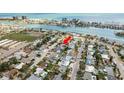 Aerial view of a neighborhood near the coast with waterways and easy beach access at 463 85Th Ave, St Pete Beach, FL 33706