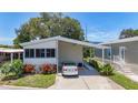 Charming home with carport, landscaped yard and convenient wheelchair access ramp at 9790 66Th N St # 353, Pinellas Park, FL 33782
