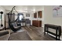 Renovated kitchen features stainless steel appliances, granite countertops, and wood flooring at 1359 S Michigan Ave, Clearwater, FL 33756