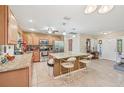 Spacious kitchen featuring granite countertops, an island with bar seating and stainless steel appliances at 3156 Depew Ave, Port Charlotte, FL 33952