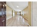 Spacious living area with tile flooring and a bright, open floor plan at 8020 Carriage Pointe Dr, Gibsonton, FL 33534