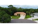 Beautiful single-story home on a cul-de-sac with a tile roof and three-car garage at 1827 Foxboro Ct, Oldsmar, FL 34677