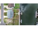 Property lines of waterfront home featuring a private dock on the canal with access to the open water at 4279 Newport Dr, Hernando Beach, FL 34607