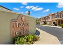 Inviting sign for The Villas at Date Palm, showcasing the well-maintained community at 829 Date Palm Ln, St Petersburg, FL 33707