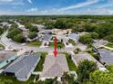 Residential neighborhood with tree lined streets showcasing the property's location in a suburban setting, with easy access at 12200 Hunters Lake Dr, New Port Richey, FL 34654