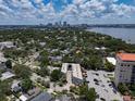 Expansive aerial view showing the building's place among the community with downtown in the background at 1508 S Howard Ave # A, Tampa, FL 33606