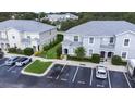 An aerial view shows the well-maintained complex with parking at 2020 Greenwood Valley Dr, Plant City, FL 33563