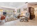 Inviting living room featuring neutral walls, a serene view, and comfortable seating arrangements at 2700 Bayshore Blvd # 6210, Dunedin, FL 34698
