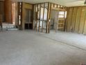 Spacious living room featuring exposed framing, ready for customization and renovation at 3811 Huntington Ne St, St Petersburg, FL 33703