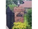 Close up of brick gate post with decorative address sign at 3923 Hudson Ln, Tampa, FL 33618