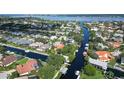 Waterfront community showcasing canal access and lush greenery surrounding the properties at 4743 Spinnaker Dr, Bradenton, FL 34208