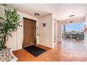 Hallway featuring elevator access, tile floors, and convenient access to upper floors at 5623 80Th N St # 415, St Petersburg, FL 33709