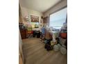 Cluttered room with lots of things and lots of natural light from the windows at 1420 36Th N Ave, St Petersburg, FL 33704
