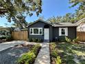 Charming home featuring a well-manicured lawn and a welcoming entrance at 3018 11Th N Ave, St Petersburg, FL 33713